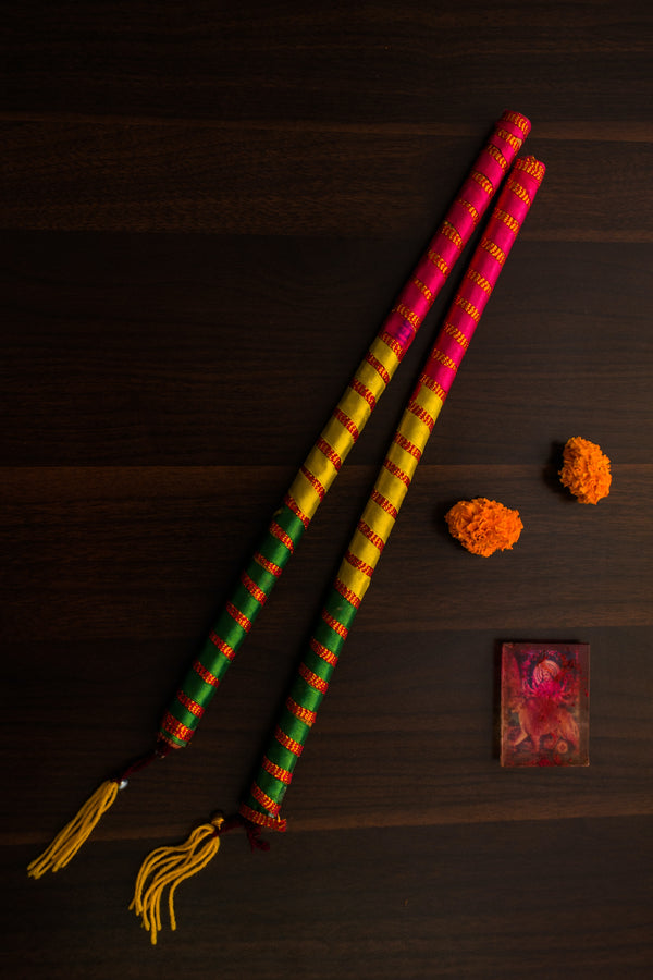 These are Dandiya. used in Navratri as a dancing equipment.